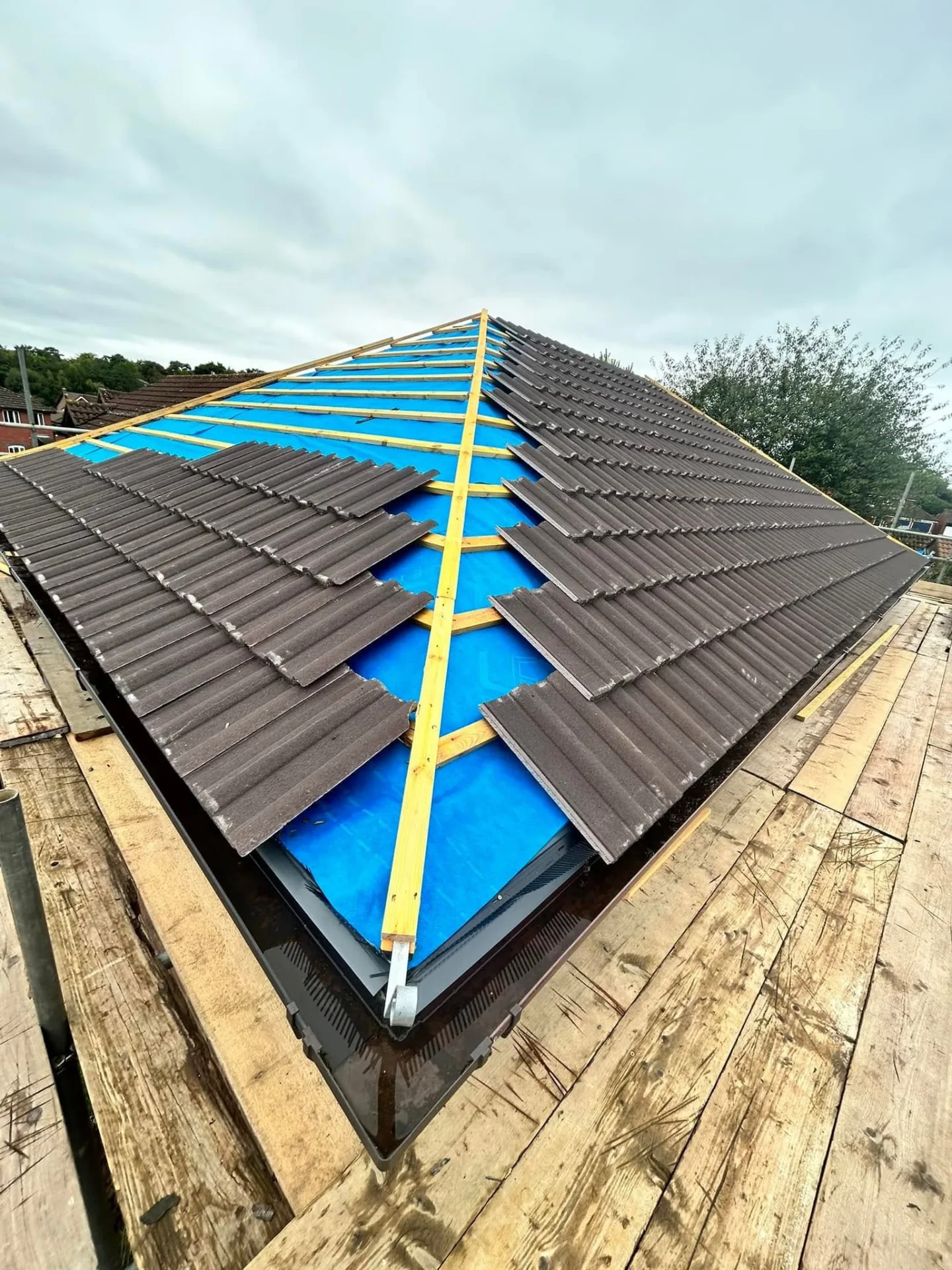 Full roof replacement in progress with new underlay and battens