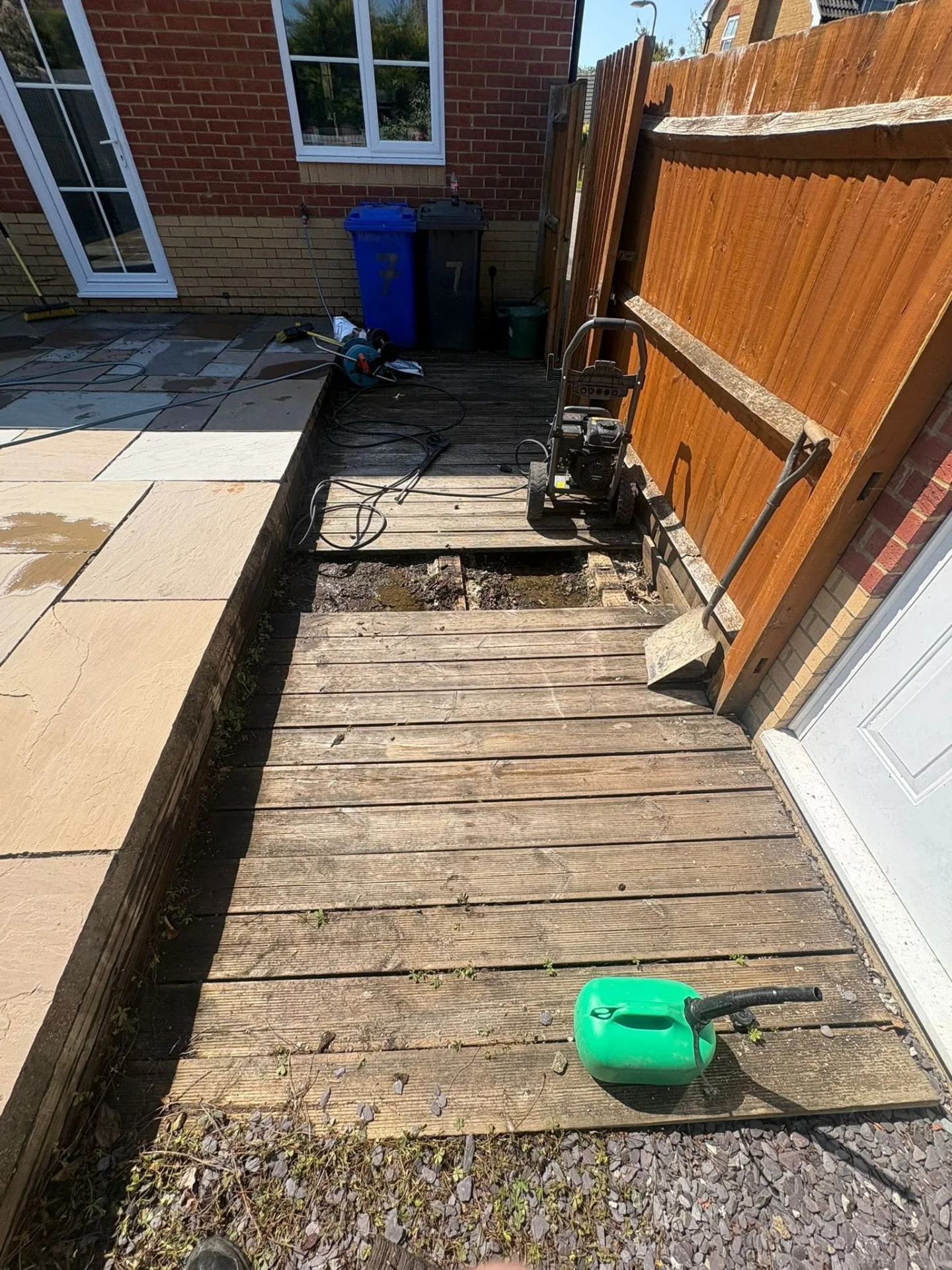Garden decking area before property services work