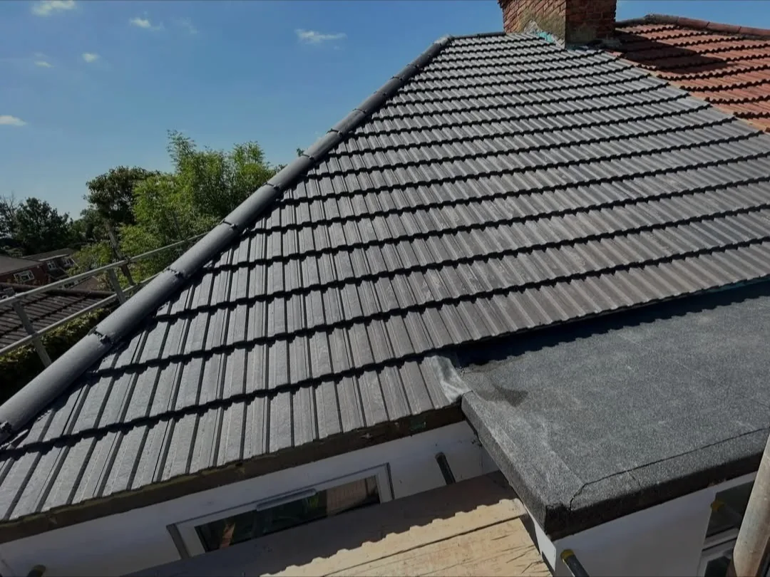 Finished pitched roof with new tiles and clean ridge line
